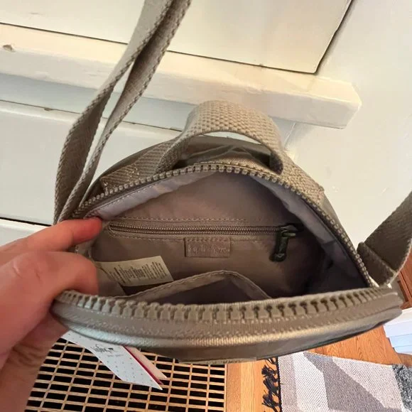 Kipling Metallic Bronze Round Crossbody with Plush Monkey Charm - Picture 3 of 6